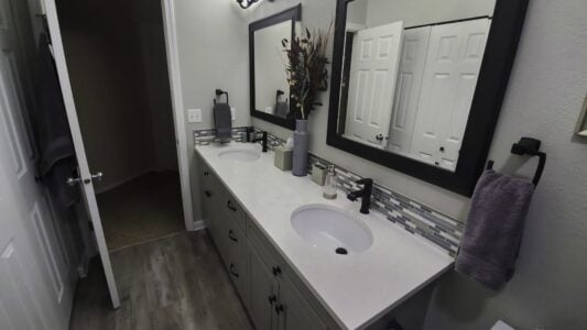 remodeled bathroom with new dual vanity