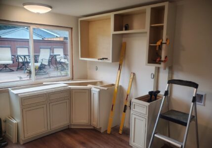 work in process installing cabinets