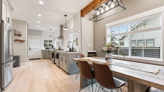 a galley kitchen remodel with dining room