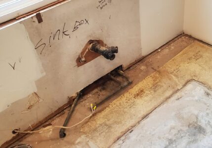 exposed water lines in kitchen